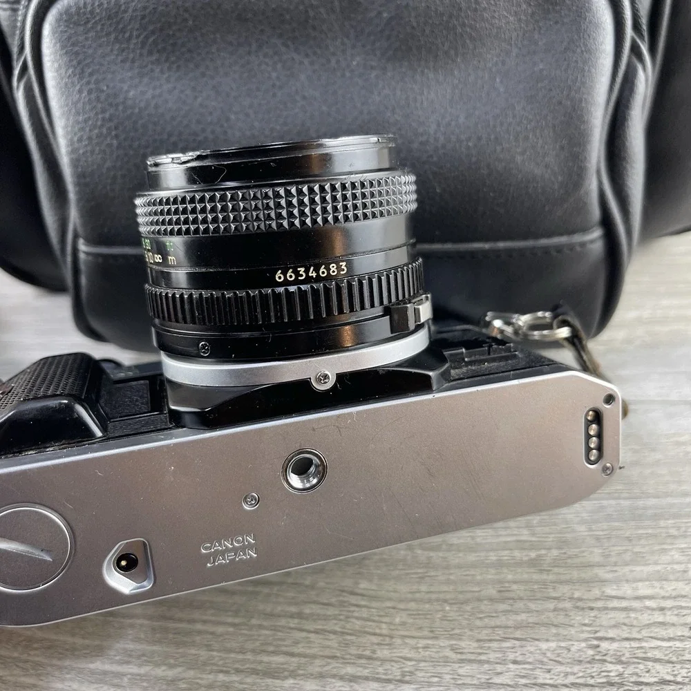 Canon AE-1 35mm SLR Film Camera w/ 50mm f/1.4 FD Lens